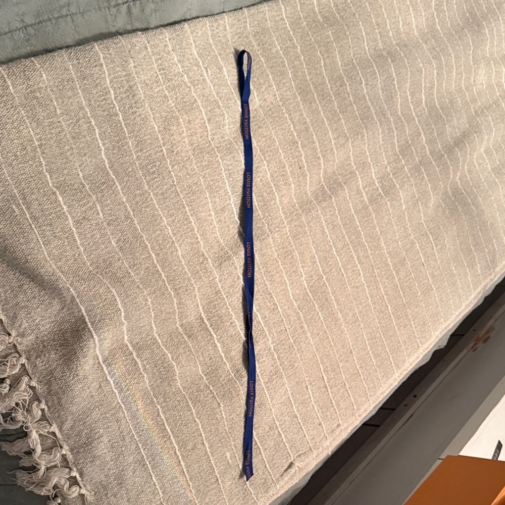 Louis Vuitton Blue Ribbon with Gold Text